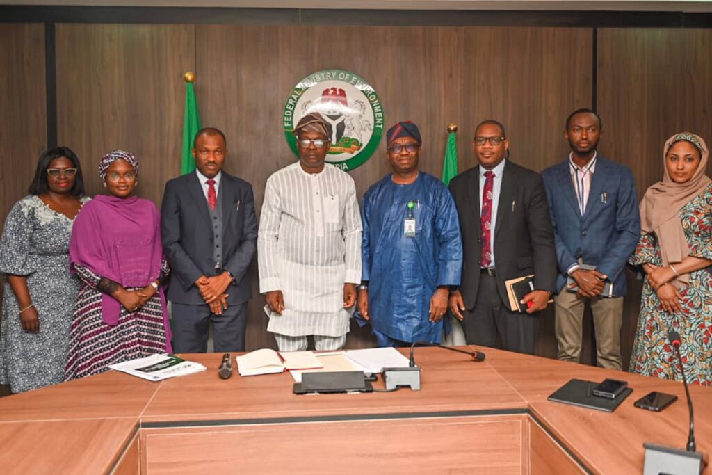 4th left, Hon Minister of State for Environment, Dr Iziaq Adekunle Adeboye Salako, 4th right, National Commissioner/ CEO, Nigeria Data Protection Commission, Dr. Vincent Adetola and other staff of the commission during the official working visit of the Commission to the Federal Ministry of Environment, Abuja.