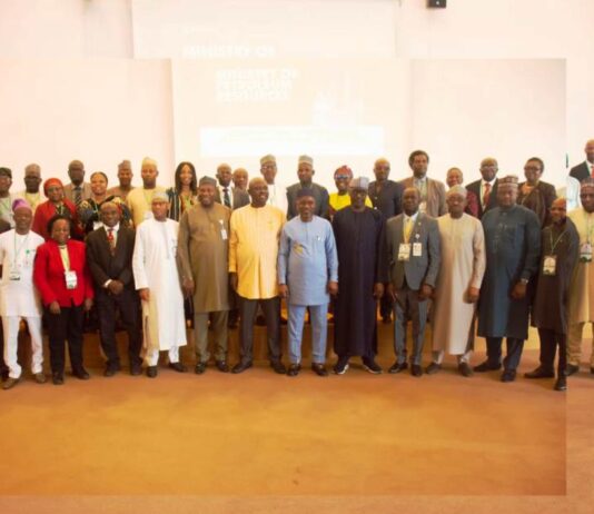 Group photograph of the Honourable Ministers of State Petroleum Resources (Oil and Gas) Sen. Heineken Lokpobiri Ph.d and Rt. Hon. Ekperikpe Ekpo (c) flanked by the Permanent Secretary, Ministry of Petroleum Resources, Amb. Nicholas Agbo Ella, the Directors and Heads of Units in the Ministry and the Heads of Agencies under the Ministry of Petroleum Resources at the 2024 Ministry's sector retreat in Abuja