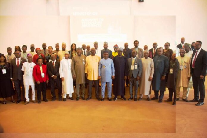 2024 Petroleum Sector Reform4 Group photograph of the Honourable Ministers of State Petroleum Resources (Oil and Gas) Sen. Heineken Lokpobiri Ph.d and Rt. Hon. Ekperikpe Ekpo (c) flanked by the Permanent Secretary, Ministry of Petroleum Resources, Amb. Nicholas Agbo Ella, the Directors and Heads of Units in the Ministry and the Heads of Agencies under the Ministry of Petroleum Resources at the 2024 Ministry's sector retreat in Abuja