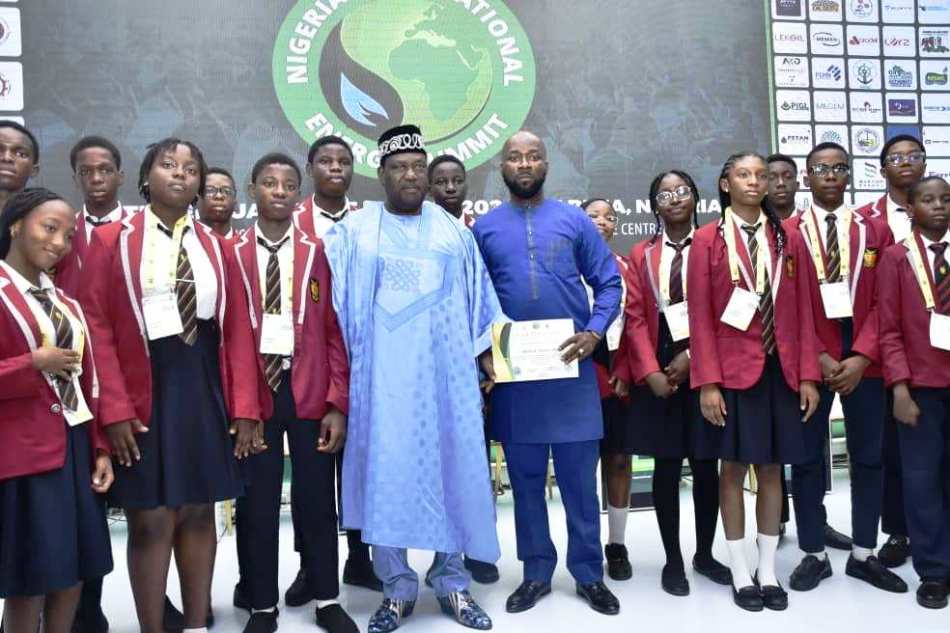 Secretary to the Government of the Federation, H.E. George Akume (4th left) in a photograph with representatives of Britarch Secondary School, Abuja after the presentation of Certificate of Participation at 2024 NIES during the closing ceremony of 7th edition of Nigeria International Energy Summit in Abuja.