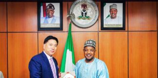 Mr. Li-Zheusheng leader of the CAETPC delegation presenting a souvenir to the Hon. Minister of Budget and Economic Planning Sen. Abubakar Atiku Bagudu yesterday.