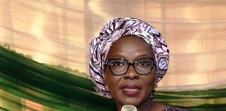 SGF/PS, Federal Ministry of Justice, Beatrice Jedy _ Agba,OON, mni, presenting opening remarks at the Ministerial Service Award for Justice Sector in Commemoration of Nigeria Public Service, at the Olusegun Obasanjo Auditorium, Federal Ministry of Justice Abuja. 22/3/2024