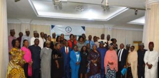 Group photograph of Permanent Secretaries, Special Duties Office, Dr. Magdalene Ajani, Common Service Office, Mr. Omenka Raymond and Participants at the Workshop