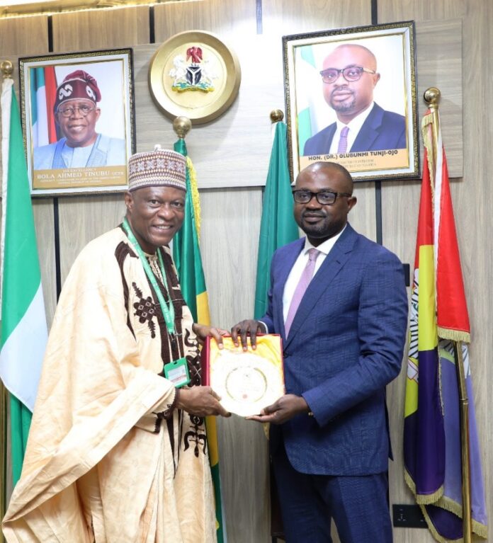 Dr. Tunji-ojo L-R VC, University of Abuja, Prof. Abdul Rasheed Na'Allah and Minister of Interior, Hon. (Dr.) Olubunmi Tunji-Ojo