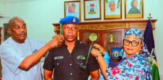 L-R: Chairman of Police Service Commission, Dr. Solomon Arase and Minister of State, Hajia Imaan Sulaiman-Ibrahim, decorating newly promoted Chief Security Officer (CSO) Minister of Police Affairs SP Abdul Gafar Bichi at the Headquarters of the Ministry in Abuja