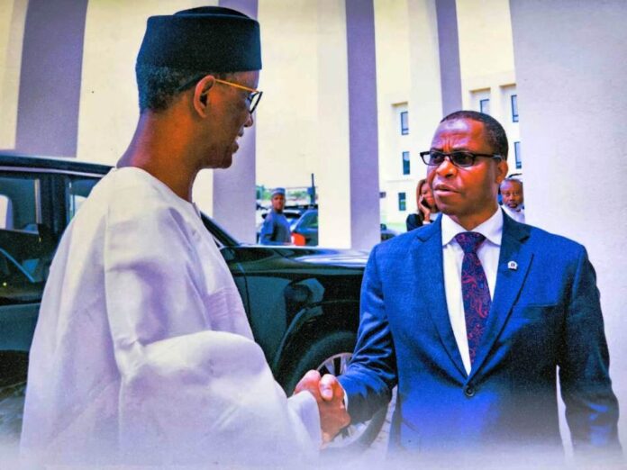 Mallam Nuhu Ribadu and Rear Admiral YEM Musa National Security Adviser, Mallam Nuhu Ribadu in a handshake with the National Coordinator, National Counter Terrorism Centre, Rear Admiral YEM Musa (rtd), PhD.