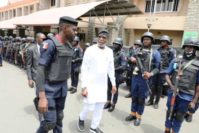 Mining Marshals1 The Honourable Minister Dr Dele Alake being assisted by the Commander of the contingent to inspect the Guard of Honour mounted by the contingent of Mining Marshals at the premises of the Ministry.