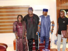 Hon. Chairman, Federal Civil Service Commission (FCSC), Prof. Tunji Olaopa (Middle in Black) with the President, PLWD group, Mr. Joshua Dauda Bungon (Immediate Right) and other members of the association during their courtesy visit to the Chairman.