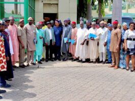 Managing Director/CEO, FERMA, Engr. (Dr.) Chukwuemeka Agbasi, FNSE, FNIHTE, and the Chairman, House of Reps. Committee on FERMA, Engr. Aderemi Abasi Oseni, in a group photograph with other members of the Committee and the Management Staff of FERMA during the Committee’s Oversight visit to FERMA on Thursday 7th March, 2024