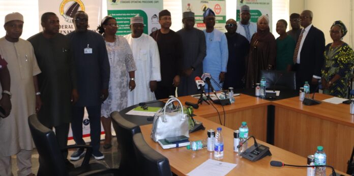 Pix 4 Managing Director/CEO, FERMA, Engr. Chukwuemeka Agbasi, Ph.D. DIC, FNSE, FNIHTE, and the Director General, Bureau of Public Service Reforms (BPSR), Dr. Dasuki Ibrahim Arabi, FICD, in a group photograph with the delegation from BPSR and the Management Staff of FERMA during the DG’s visit to FERMA