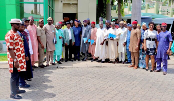 Pix 4 Managing Director/CEO, FERMA, Engr. (Dr.) Chukwuemeka Agbasi, FNSE, FNIHTE, and the Chairman, House of Reps. Committee on FERMA, Engr. Aderemi Abasi Oseni, in a group photograph with other members of the Committee and the Management Staff of FERMA during the Committee’s Oversight visit to FERMA on Thursday 7th March, 2024