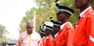 Minister of Police Affairs, Senator Ibrahim Gaidam inspecting Quarter Guard mounted by the cadets of the Police Academy during an official visit to the Police College Wudil, Kano State.