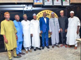 Minister and Minister of State, Housing and Urban Development , Arch Ahmed Dangiwa and Abdullahi Tijjani Gwarzo in a group photograph with the leadership of Real Estate Developers Association of Nigeria (REDAN) during their visit to his office.