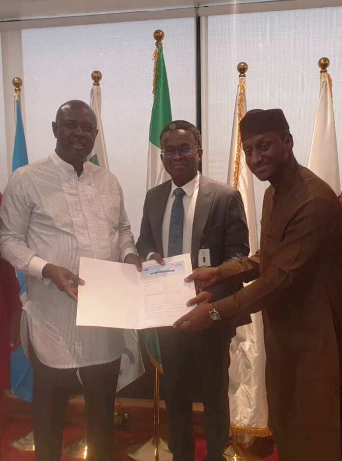 Special Mandate to Support Industry1 Honourable Minister of State Petroleum Resources (Oil) Sen. Heineken Lokpobiri Ph.d (left) receiving the document on the activities of SPE Nigeria Council from the Council's Board of Trustee (BOT) Chairman, Emeka Ene (c) and 2024 SPE NC Chairman, Salahuddeen M. Tahir (right) during the visit to the Minister in Abuja.