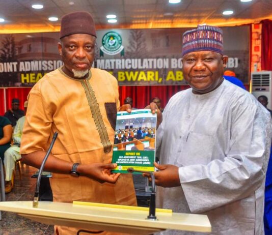 L-R. The Registrar JAMB, Prof. Oloyede receiving award from DG BPSR, Mr. D. I Arabi.