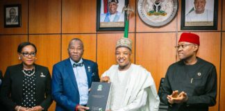 The President and Chairman of the Nigerian Council of Registered Insurance Brokers (NCRIB) Prince Babatunde Oguntade FIIN, FCIB presenting a compendium on NCRIB@ 60 to the Hon. Minister Sen. Abubakar Atiku Bagudu in his office, while the Permanent Secretary FMBEP Mr. Nebolisa Anako looks on.