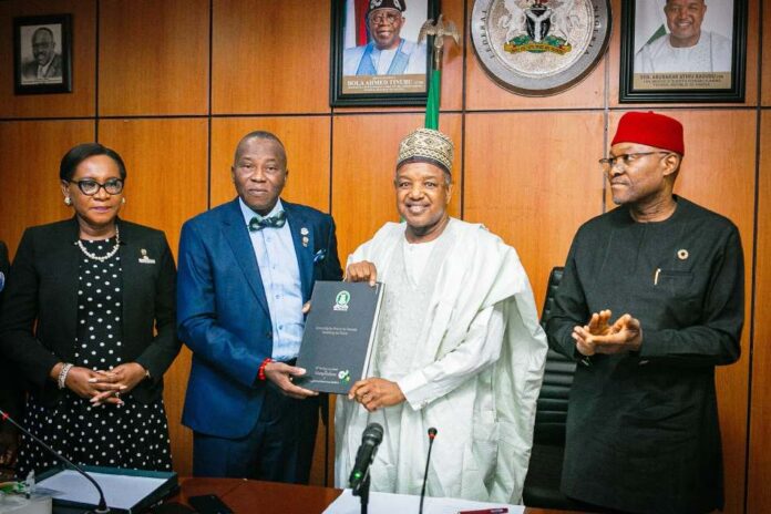 compendium on NCRIB The President and Chairman of the Nigerian Council of Registered Insurance Brokers (NCRIB) Prince Babatunde Oguntade FIIN, FCIB presenting a compendium on NCRIB@ 60 to the Hon. Minister Sen. Abubakar Atiku Bagudu in his office, while the Permanent Secretary FMBEP Mr. Nebolisa Anako looks on.