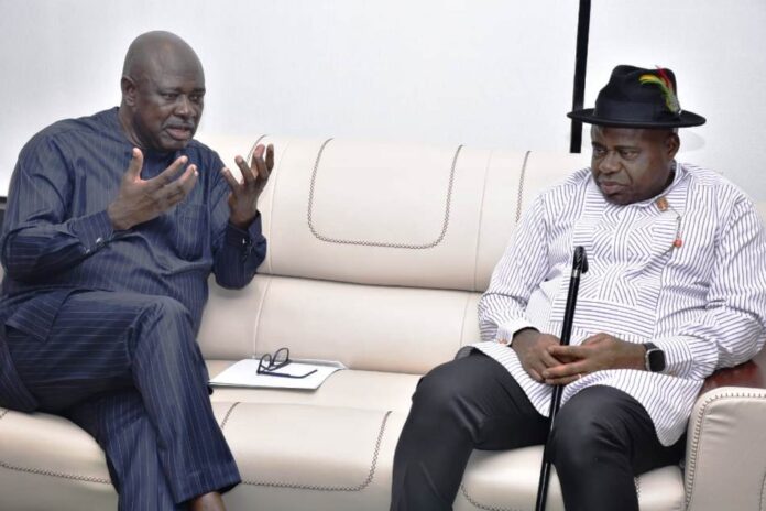 courtesy visit to the Minister1 Honourable Minister of State Petroleum Resources (Oil) Sen. Heineken Lokpobiri Ph.d (left) giving his response to the Governor of Bayelsa State, His Excellency, Senator Douye Diri (right), during his courtesy visit to the Minister in Abuja.