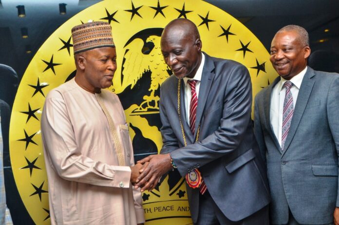 courtesy visits to the Ministry4 Hon. Minister of State Housing and Urban Development, Abdullahi Tijjani Gwarzo; receiving President, Nigeria Institute of Brokers and Lender; QS, Hayatuddeen Auwal with members of his Delegations during a courtesy visits to the Ministry.