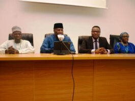Permanent Secretary, Ministry of Petroleum Resources, Amb. Nicholas Agbo Ella (2nd Left)) ; Director, Planning Research and Statistics in the Ministry, Mr. Usman Abdulkadir(1st left); Director, Human Resources Management in the Ministry, Mrs. Shehu Asma'u Adaji (1st right) and Prof. Olu Olasode of TL First Consulting Group delivering his closing remarks at the end of the retreat.