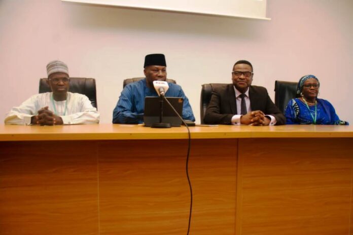 implementing Ministerial Deliverables2 Permanent Secretary, Ministry of Petroleum Resources, Amb. Nicholas Agbo Ella (2nd Left)) ; Director, Planning Research and Statistics in the Ministry, Mr. Usman Abdulkadir(1st left); Director, Human Resources Management in the Ministry, Mrs. Shehu Asma'u Adaji (1st right) and Prof. Olu Olasode of TL First Consulting Group delivering his closing remarks at the end of the retreat.