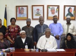 Seated |L-R: DCP Aremu Bamidele; Director Finance & Account (NPTF), Omotosho Olubunmi; Director Legal (NPTF), Mallam A. A. Adamu; Permanent Secretary, Dr. Nasir Sani Gwazo; Director Legal (MPA), Fati Lamorde; Director Police Inspectorate (MPA), Bola Aderele; Director Planning, Research and Statistics, Azeez Margaret; Deputy Director Legal (FMOJ), Sangaril Victoria Mariam, and others members during the inauguration of the 24-man committee on review of the Nigeria Police Trust Fund (NPTF) Act 2019 at the Ministry Headquarters in Abuja.