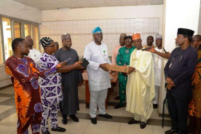 50 Tonnes of Dates Donated by Saudi Arabia1 (4th left) Permanent Secretary Federal Ministry of Humanitarian Affairs and Poverty Alleviation, Abel Enitan, (5th left) Permanent Secretary Ministry of Foreign Affairs, His Excellency , Ambassador Adamu Ibrahim Lamuwa, during the handing over of 50 Tonnes of dates donated by the Kingdom of Saudi Arabia for distribution to Internally Displaced Persons across Nigeria, held on Friday 26th April, 2024, at Ministry of Foreign Affairs, Abuja.
