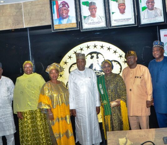 Honourable Minister of State for Housing and Urban Development, Abdullahi Tijjani Gwarzo in meeting with the delegation from the International Women Communication Centre (IWCC), at the ministry's headquarters Abuja.