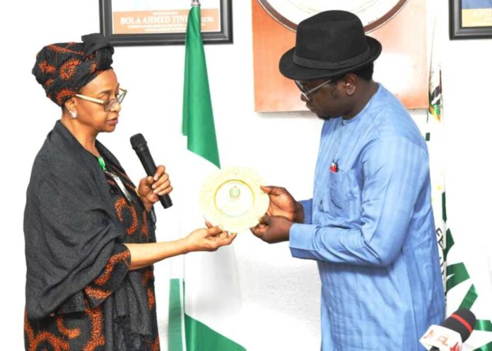 Digital Economy to Empower Youth1 L-R: Salman Mann N, Head of Delegation presenting a plague to the Hon. Minister of State for Youth Development, Ayodele Olawande during the Strategic Institutions study tours of the Senior Executive course 46, 2024 of the National Institute for Policy and Strategic Strategic Studies Kuru , Plateau state to the Federal Ministry of Youth Development today, April 16, 2024.
