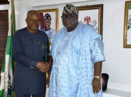 Hon. Chairman FCSC, Prof. Tunji Olaopa (R) with the FCT-CSC Chairman, Engr. Emeka Ezeh.