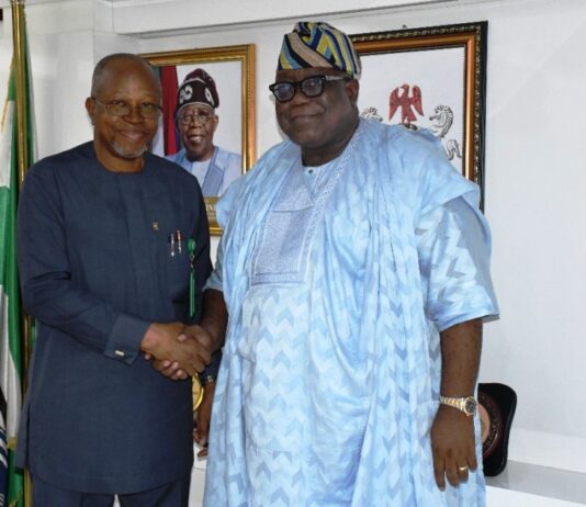 Hon. Chairman FCSC, Prof. Tunji Olaopa (R) with the FCT-CSC Chairman, Engr. Emeka Ezeh.