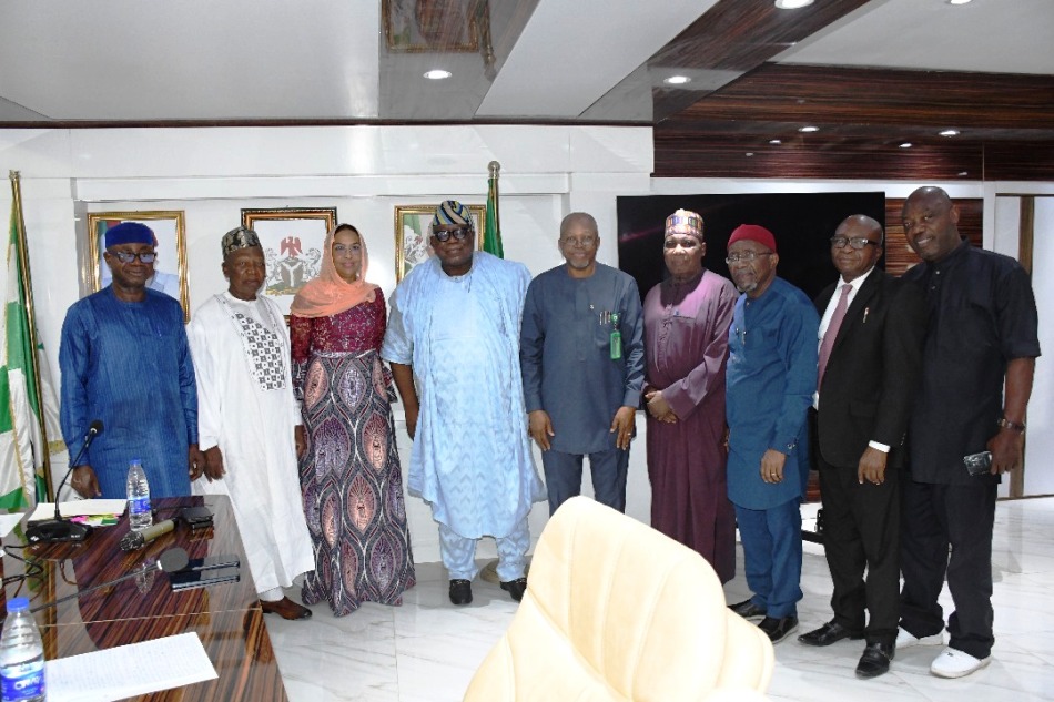 Hon. Chairman FCSC, Prof. Tunji Olaopa (L) with CSC Chairman, Engr. Emeka Ezeh (immediate Right) flanked by (L & R) by FCSC Hon. Commissioners.
