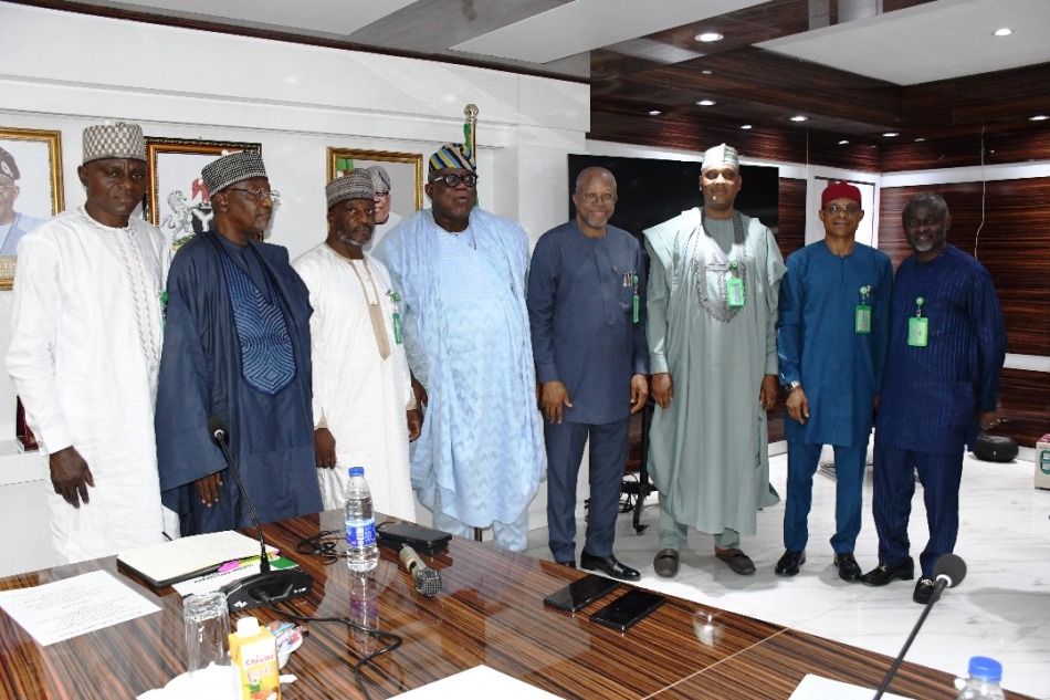 Hon. Chairman FCSC, Prof. Tunji Olaopa (L) with CSC Chairman, Engr. Emeka Ezeh (Immediate Right) flanked by (L & R) by FCT-CSC Hon. Commissioners.