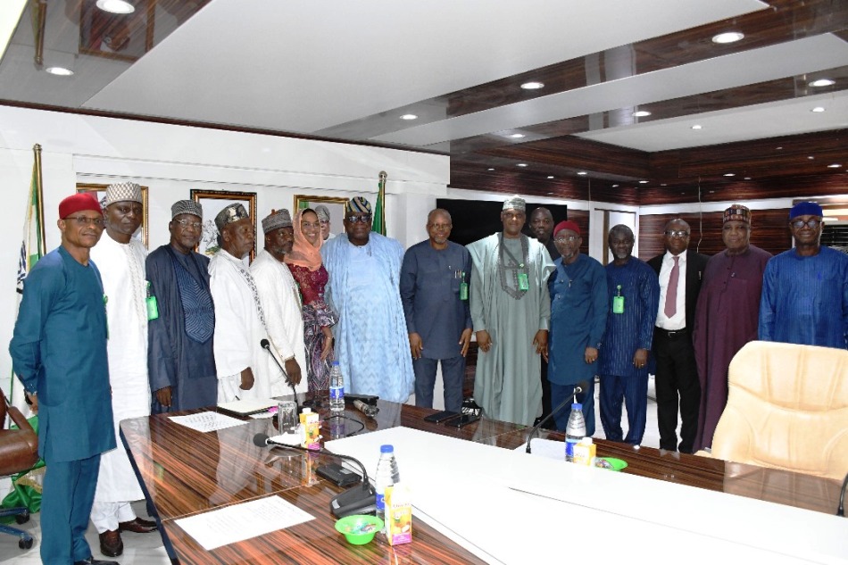 Hon. Chairman FCSC, Prof. Tunji Olaopa (R) with CSC Chairman, Engr. Emeka Ezeh (L) and flanked (L & R) by combined FCSC and FCT Hon. Commissioners.
