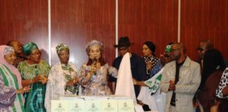 Honourable Minister of Women Affairs, Barrister (Mrs) Uju Kennedy-Ohanenye Unveiling the National Guidelines on Women and Girls' Empowerment for Optimal Nutrition in Abuja today. To her left is the Representative of the Permanent Secretary, Mr. Tony Iwere