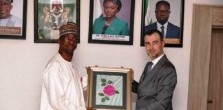 Mr. Yunus Sonmez, Director General of the Cabinet , ICYF Presenting a gift to Dr. Dunama Umar Ahmed, Permanent Secretsry Federal Ministry of Youth Development, during his courtesy visit on the Permanent Secretary.