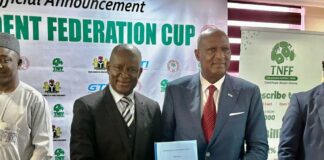 The minister of sports Senator John owan Enoh and CEO of GTI Mr Abubakar lawal after the signing of the mou