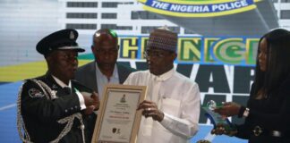 CSP Odeyemi Oladimeji, O/C Antikidnapping Unit, Imo State Command receiving his award of Crime Buster of the Year from Minister of Police Affairs, Senator Ibrahim Gaidam during the maiden edition of the award ceremony of the Nigeria Police Awards and Commendations held at the Congress Hall, Transcorp Hilton, Abuja.
