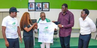 L- R The Secretary of the Nigeria Olympians Association, Emmanuel Babayero, Olympian medalist, Christy Opara, the Honourable Minister of Sports Development, Senator John Owan-Enoh, the President, Nigeria Olympians Association, Olamide Oyedeji and another member, Oluwafemi Ajiloye during the decoration of the Minister by the President of the Association.