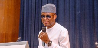 The Honourable Minister of Sports Development Senator John Owan-Enoh delivering his key note address at the 2024 inaugural African Sports and Tourism Award ceremony held at Congress Hall Transcorp Hilton Hotels Abuja