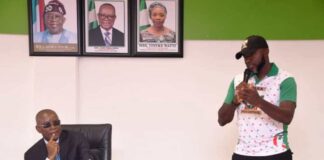 The Honourable Minister of Sports Development, Senator John Owan-Enoh being addressed by the Secretary Unity Schools Old Students Association, Anthony Anene Chidi, when the Association paid him a courtesy visit in his office recently.