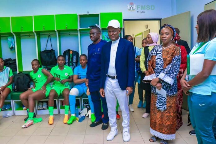 Super Falcons vs South Africa1 The Honourable Minister of Sports Development, Senator John Owan Enoh and the Permanent Secretary Ministry Sports Development, Tinuke Watti congratulating the Super Falcons after their match against Bayana Bayana of South Africa in Abuja recently.
