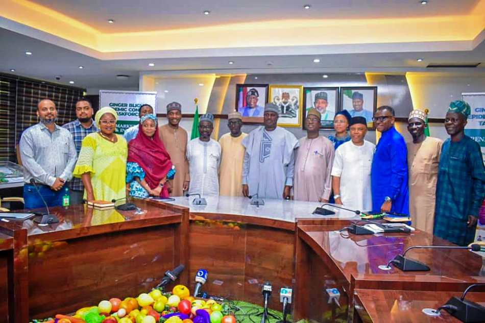The Minister of State, Agriculture and Food Security, Sen Aliyu Sabi Abdullahi,(C) and Members of the Taskforce during the inauguration ceremony.