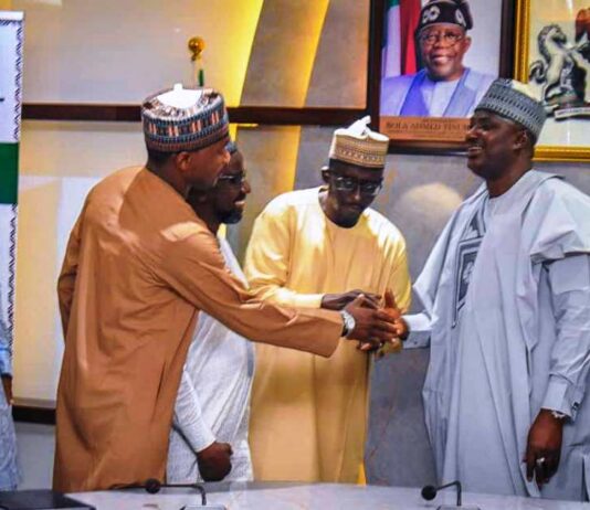 The Minister of State, Agriculture and Food Security, Sen Aliyu Abdullahi, receiving Members during the inauguration.