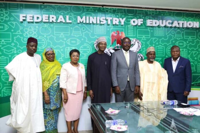courtesy visit to the Honourable Minister 1 Minister of Education Prof Tahir Mamman OON, SAN, (C) Minister of State for Education, Hon. Dr. Yusuf Tanko Sununu(2nd Left), The Permanent Secretary Federal Ministry of Education, Mrs. Didi Esther Walson-Jack,( pink suit ), The President Abuja Chamber of Commerce and Industry Chief Emeka Obegolu (in gray suit) , The Former President ACCI , Prince Adeyokunbo Kayode and Other members of ACCI during a courtesy visit to the Honourable Minister at the Minister's Conference room Abuja.