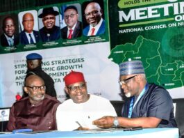 R-L,,, THE PERMANENT SECRETARY MNDD, *DR SHUAIB BELGORE* THE DEPUTY GOVERNOR OF DELTA STATE, *SIR MONDAY ONYEME* AND DELTA STATE SECRETARY TO THE GOVERNMENT, *DR.KINGSLEY EMUH* INTERACTING DURING THE COUNCIL MEETING IN ASABA, DELTA STATE..