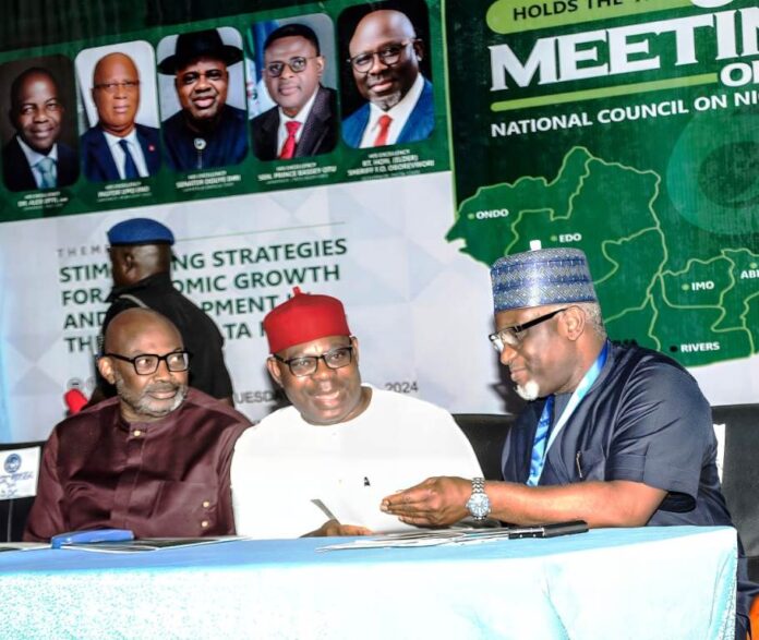 R-L,,, THE PERMANENT SECRETARY MNDD, *DR SHUAIB BELGORE* THE DEPUTY GOVERNOR OF DELTA STATE, *SIR MONDAY ONYEME* AND DELTA STATE SECRETARY TO THE GOVERNMENT, *DR.KINGSLEY EMUH* INTERACTING DURING THE COUNCIL MEETING IN ASABA, DELTA STATE..