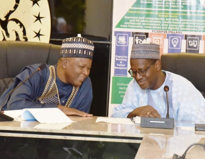 Affordable Houses to All Nigerians4 Minister and Minister of State, Housing & Urban Development, Arch Ahmed Dangiwa and Abdullahi Tijjani Gwarzo during a meeting with members of Renewed Hope Multipurpose Cooperative Society