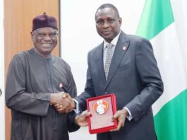 L-R: Director-General, BPP, Mamman Ahmadu, FNIQS presented with a plaque by the Chairman, Economic & Financial Crimes Commission, EFCC, Mr. Ola Olukoyede during his visit to EFCC