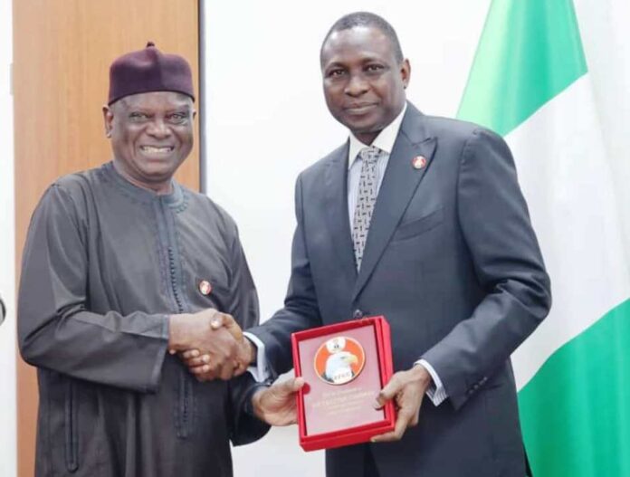 L-R: Director-General, BPP, Mamman Ahmadu, FNIQS presented with a plaque by the Chairman, Economic & Financial Crimes Commission, EFCC, Mr. Ola Olukoyede during his visit to EFCC